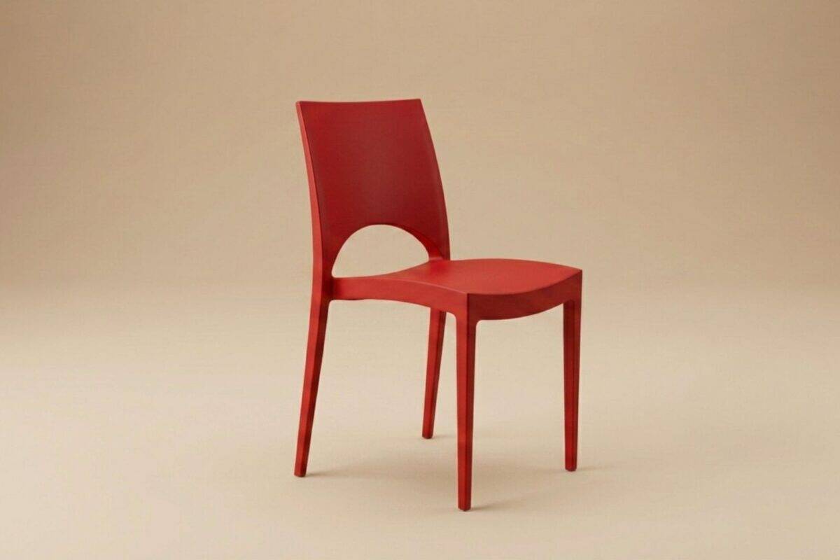 Sedia rossa moderna con schienale curvo e seduta imbottita, ideale per arredamento di interni eleganti.